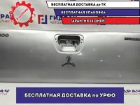 Дверь багажника нижняя Mitsubishi L200 6724A013. Есть небольшие вмятины.