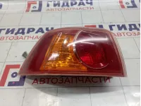 Фонарь задний наружный левый Mitsubishi Lancer X (CY) 8330A555