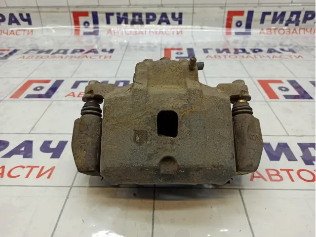 Суппорт тормозной передний левый Mitsubishi Lancer MR955063