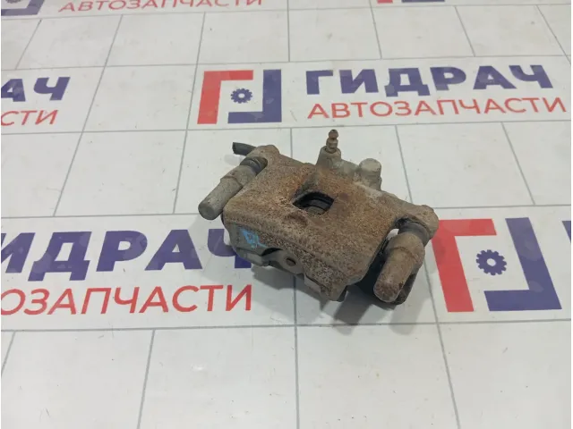 Суппорт тормозной задний левый Mitsubishi Lancer 9 MR955065