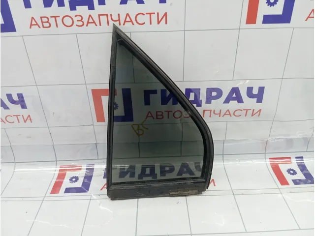 Стекло кузовное глухое (форточка) левое Mitsubishi Lancer MR525825
