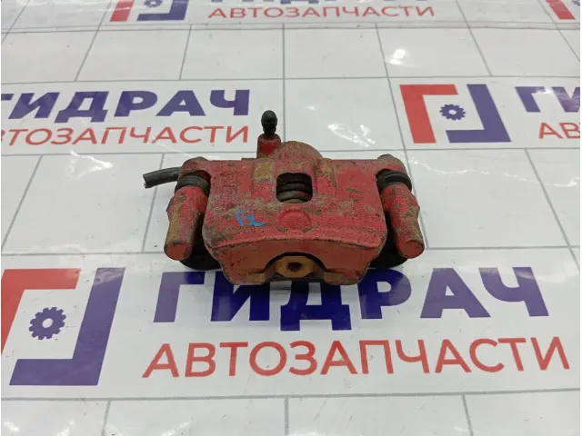 Суппорт тормозной задний левый Mitsubishi Lancer MR955065