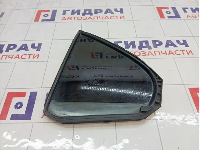 Стекло двери задней левой Mitsubishi Lancer 5740A017