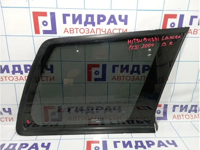 Стекло кузовное глухое правое Mitsubishi Lancer 9 (CS) MR557036