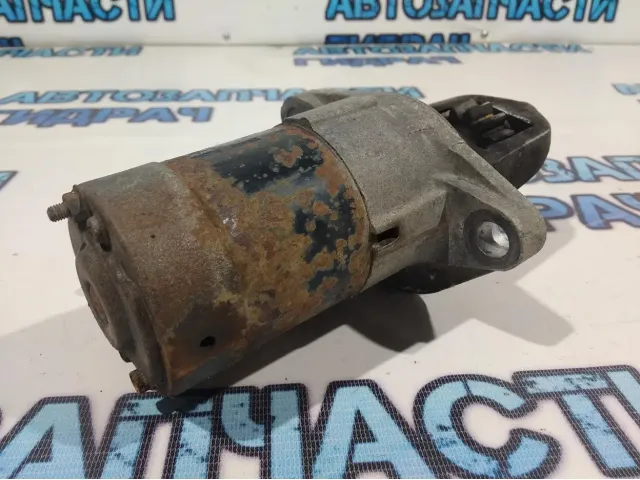 Стартер Nissan X-Trail 233008H500.