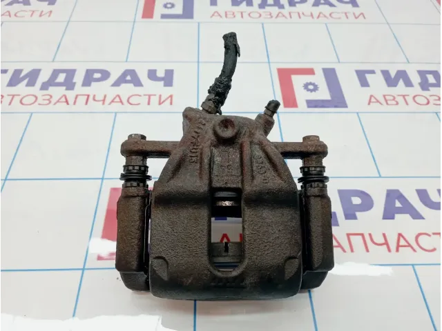 Суппорт тормозной передний левый Nissan Almera (G15) 41011-00Q0F