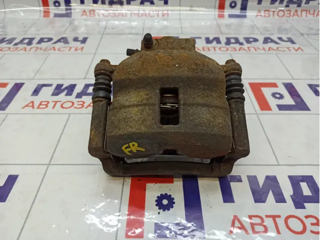 Суппорт тормозной передний правый Nissan Almera 410012F522