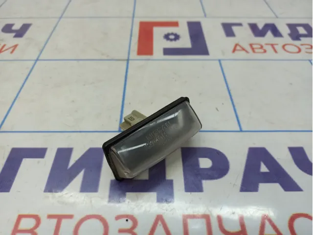 Фонарь подсветки номера Nissan Almera (G15) 26510-9Y00A