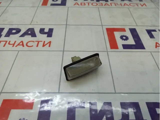 Фонарь подсветки номера Nissan Almera 265109Y00A