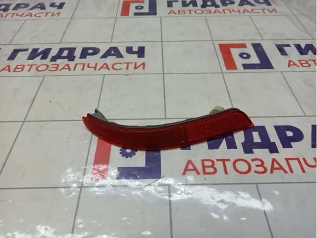 Отражатель в задний бампер правый Nissan Almera 26560EW00A