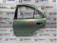 Дверь задняя левая Nissan Almera Classic (B10) . Вмятина. Коррозия.