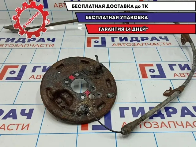 Щит опорный задний левый с тросом Nissan Almera Classic 44030-95F0B. 36531-95F0A-трос.