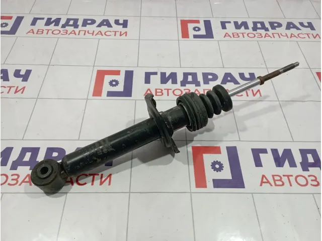 Амортизатор задний левый Nissan Almera (N16) 56210-BN825