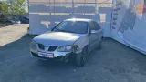 Обшивка багажника правая Nissan Almera (N16) 79920-BN702