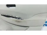 Обшивка двери передней правой Nissan Leaf 809003NB0A. Царапины.