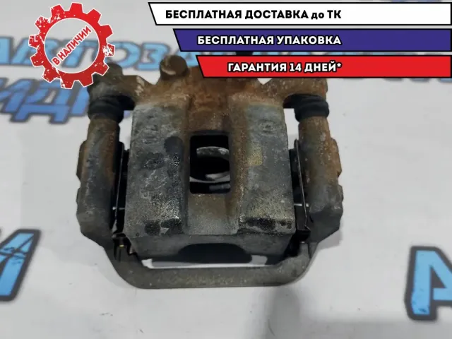 Суппорт тормозной задний левый Nissan Leaf 440113NA0A.