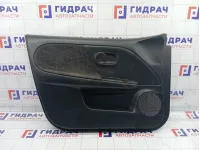Обшивка двери передней левой Nissan Note 809019U01B