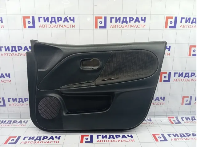 Обшивка двери передней правой Nissan Note 809009U01B