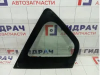 Стекло кузовное глухое (форточка) левое Nissan Note 833019U000