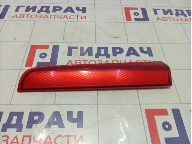 Отражатель задний правый Nissan Note 265539U00A