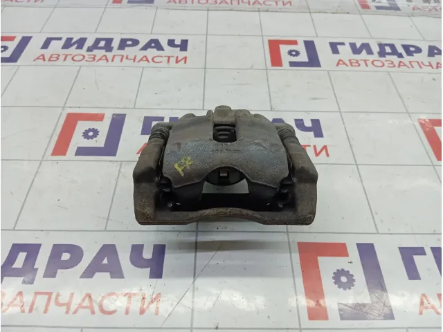 Суппорт тормозной передний правый Nissan Note 41001AX601