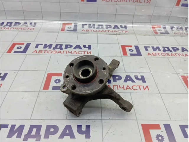 Кулак поворотный передний левый Nissan Note 40015AX600