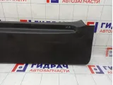 Обшивка двери багажника Nissan Note 909009U02A