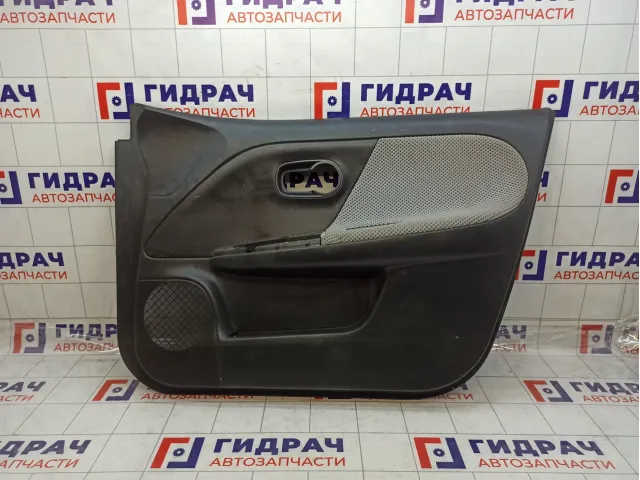 Обшивка двери передней правой Nissan Note 809009U03B