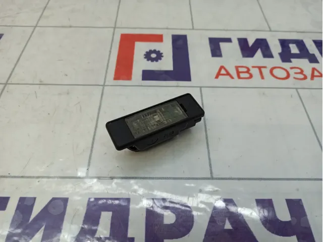 Фонарь подсветки номера Nissan Note 26510AU300