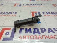 Форсунка омывателя фары левая Nissan Note 286129U000