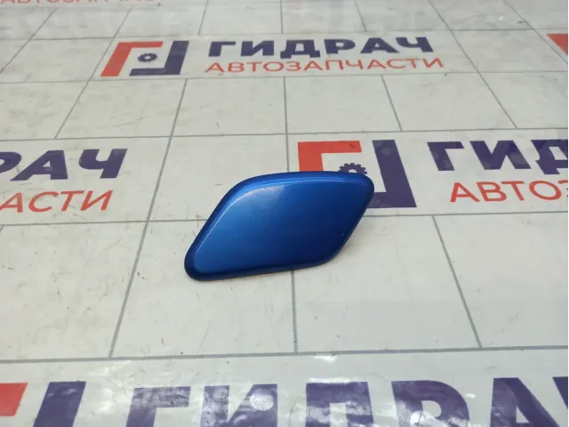 Крышка форсунки омывателя фары левая Nissan Note 286599U000