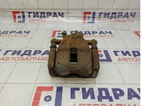 Суппорт тормозной передний правый Nissan Note 41001AX60A