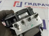 Блок ABS Nissan Note 476609U16B