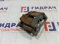 Суппорт тормозной передний левый Nissan Note 41011AX60A