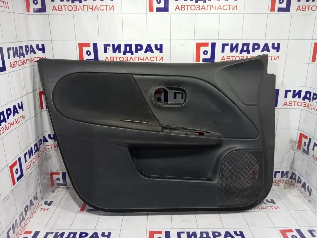 Обшивка двери передней левой Nissan Note 809019U04B