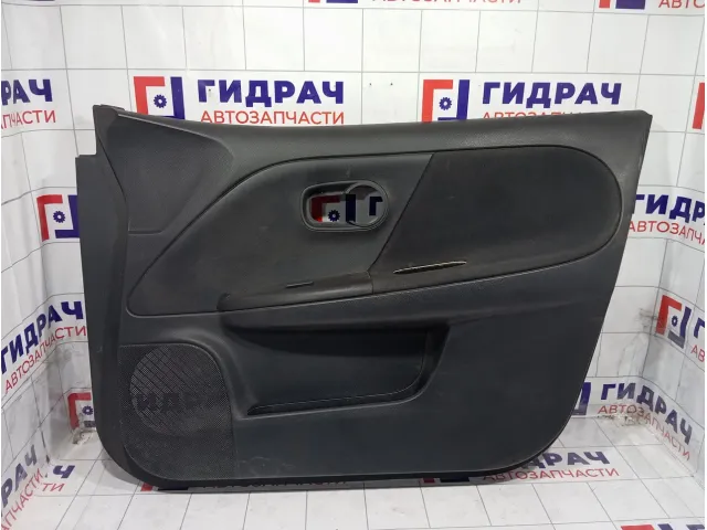 Обшивка двери передней правой Nissan Note 809009U04B