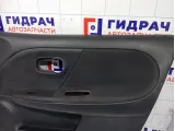 Обшивка двери передней правой Nissan Note 809009U04B
