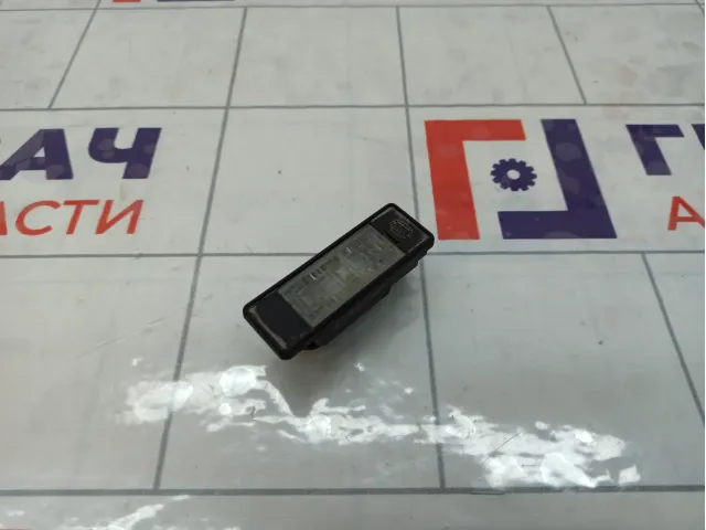 Фонарь подсветки номера Nissan Note 26510AU300