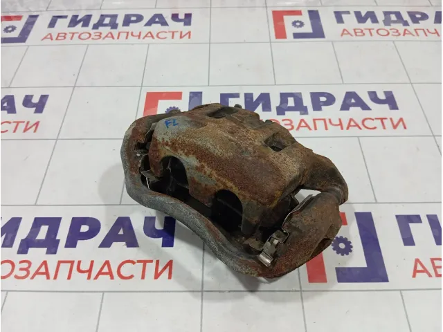 Суппорт тормозной передний левый Nissan Pathfinder 41011EB32A