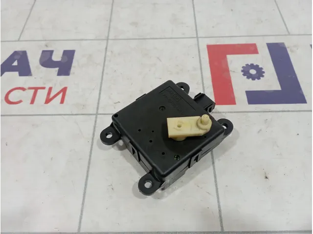 Моторчик заслонки отопителя Nissan Primera (P12) 27732-4M400
