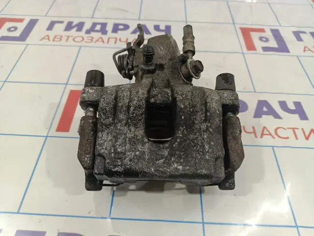 Суппорт тормозной задний левый Nissan Primera (P12) 44011-AV700