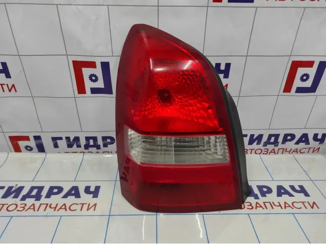 Фонарь задний левый Nissan Primera (P12) 26555-AU300