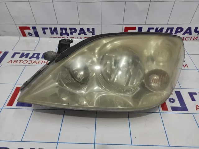 Фара левая Nissan Primera (P12) 26060-AU800