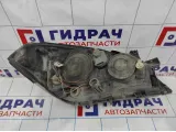Фара левая Nissan Primera (P12) 26060-AU800