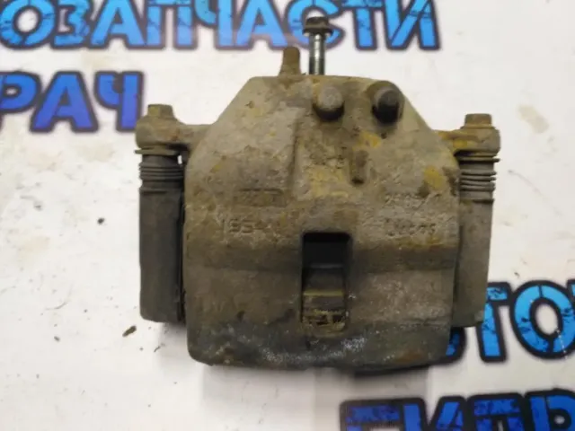 Суппорт тормозной передний левый Nissan Primera P12E 410114U10A Отличное состояние.