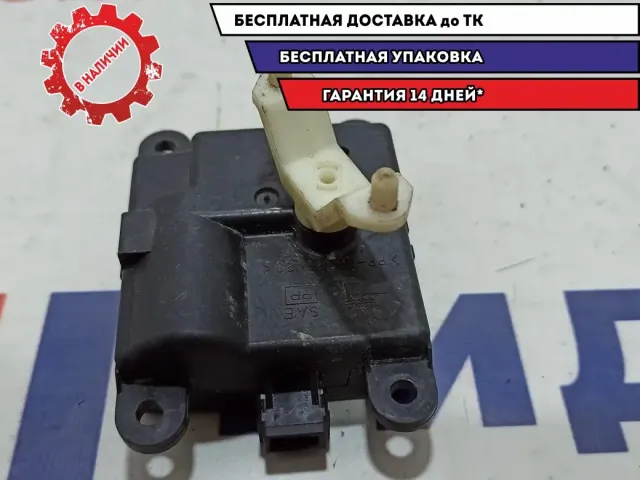 Моторчик заслонки отопителя Nissan Primera P12 3C27030840.