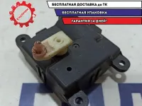 Моторчик заслонки отопителя Nissan Primera P12 27732AV600.