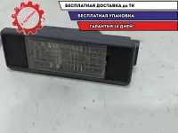 Фонарь подсветки номера Nissan Primera P12 26510-AU300.