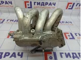 Коллектор впускной Nissan Primera (P12) 14003-AU001.