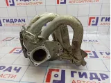 Коллектор впускной Nissan Primera (P12) 14003-AU001.